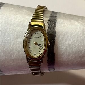Timex Gold and White Oval Dial Women's Stretch Bracelet Watch